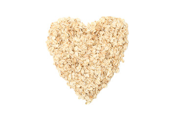 Heart made of oatmeal flakes isolated on white background