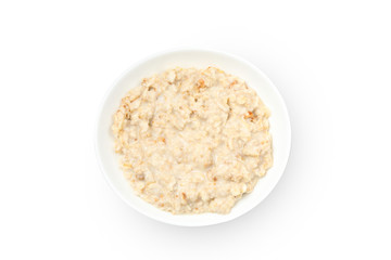 Plate with cooked oatmeal isolated on white background