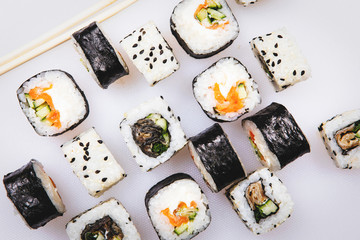 Set of sushi rolls on a white background.