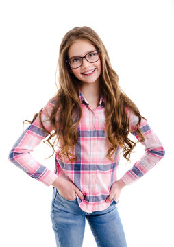 Cute little girl child preteen in eyeglasses education, school and vision concept