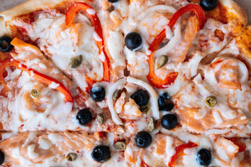 seafood pizza cheese and vegetables