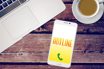 Ein Büro, Smartphone und Hotline