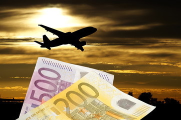 Ein Flugzeug und Euro Geldscheine