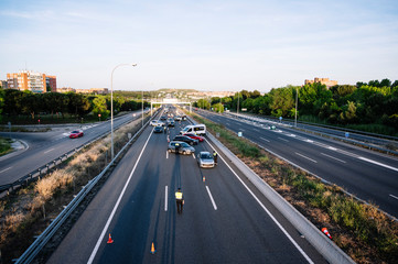 Police control on an entrance road to the city of Madrid