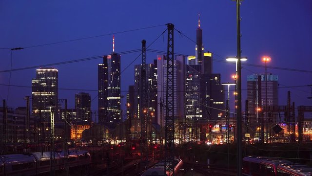 Timelapse of Skyline of Frankfurt and Main Station with Trains