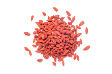 Pile of dried goji berries (Chinese wolfberry) isolated on white background. Top view.