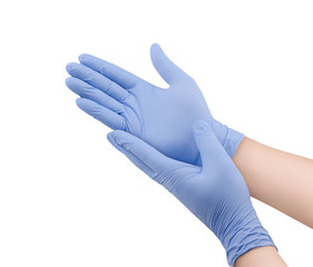 Two blue surgical medical gloves isolated on white background with hands. Rubber glove...