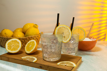 two glasses of lemonade with ice
