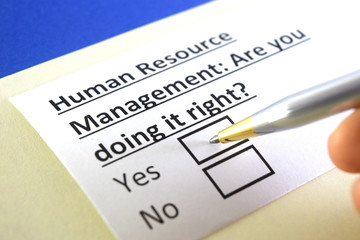 Obraz premium One person is answering question about human resource management.