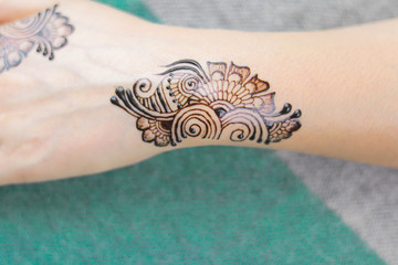 Beautiful Arabic style henna design on back hand