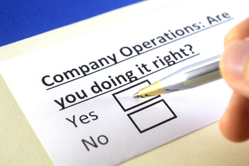 One person is answering question about company operations.