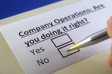 One person is answering question about company operations.