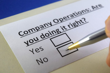 Obraz premium One person is answering question about company operations.