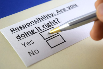 Obraz premium One person is answering question about responsibility.