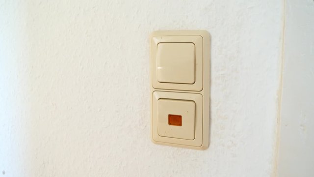 Turning on and off lightswitch with orange lamp