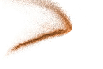 Plakat Dry river sand explosion. Brown color sand splash against white background.