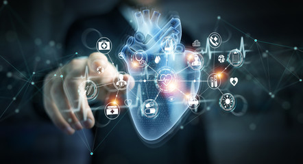 Man using digital x-ray of human heart holographic scan projection 3D rendering