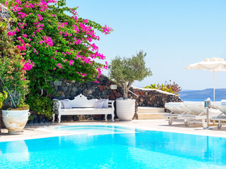 Santorini hotel terrace view. Luxury vacations. Cyclades, Greece.