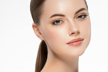 Fototapeta premium Beauty woman face clean healthy skin natural make up isolated on white