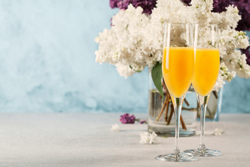 Two glasses of mimosa cocktail - 347742699