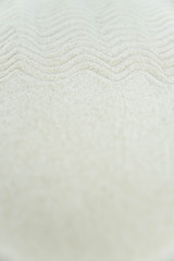 Abstract Zen drawing on white sand. Concept of harmony, balance and meditation, spa, massage, relax. Zen garden.