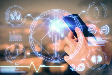 Double exposure of man's hands holding and using a phone and education theme drawing.