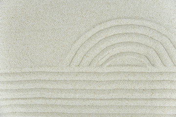 Abstract Zen drawing on white sand. Concept of harmony, balance and meditation, spa, massage, relax. Zen garden.
