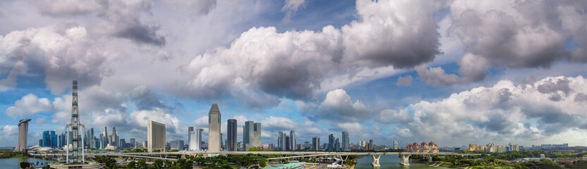 Fototapeta na wymiar Panoramic aerial view of Singapore skyline from a drone point of view at dusk