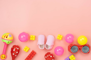 Table top view decoration kid toys for develop background concept.Flat lay accessories baby to play with items child on modern pink paper at office desk.Copy space for add text.pastel tone wallpaper.