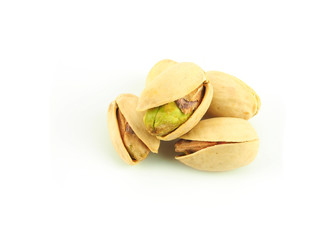 Pistachios stack isolated on a white background. High Vitamin B6 and antioxidants. Low in calories yet high in protein. Close up..