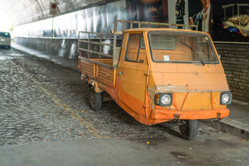 Retro Piaggio truck in Rivello tunnel the sea, Rivello, Italy.