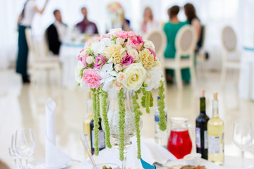 Tables set for an event party or wedding reception. Wedding dinner table set up