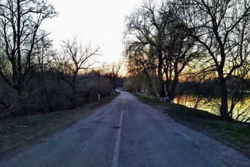 road at sunset in rural countryside at spring