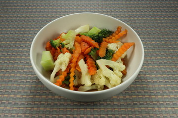 Fried chopped green broccoli and sliced carrot seasoning with traditional sauce and pepper. High vitamin and nutrition food. Diet and healthy food. Famous vegetarian food in restaurant.