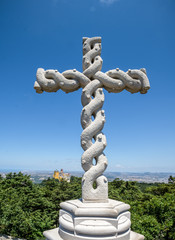 Naklejka premium Cruz Alta or High Cross stands at the highest point in the Sintra hills in park of Sintra