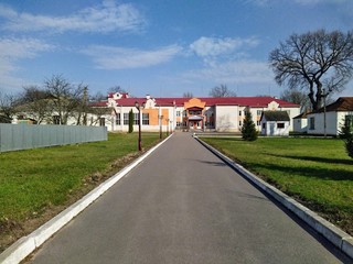 Village school in sunny daytime at spring season