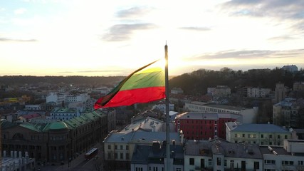 Lithuanian flag in the wind. Drone aerial view.