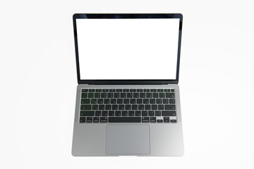 Close-up top view of ultrabook, a thin and light laptop, in space grey color on white isolated background