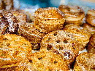 Fresh bread, rolls, cookies and other pastries. A close-up. Supermarket. Mobile photo.