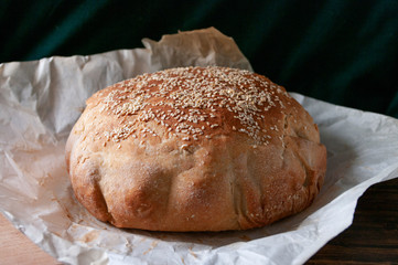 Sourdoudh doudg bread with sesame seeds on top. Fresh baked home made. Healthy food. Natural.