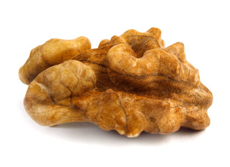 Single half of walnut , isolated on white background, macro shot