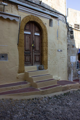 Greece Rhodes, 11/07/2018 : The old fortress of the island. Entrance wooden door in the old part of the city.