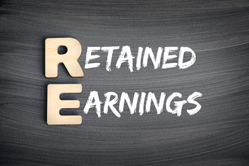 RE - Retained Earnings acronym, business concept on blackboard