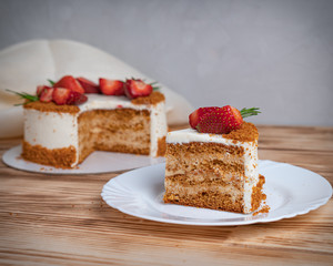 honey cake with strawberries and rosemary