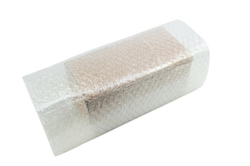 Bubbles covering the box by bubble wrap for protection product cracked white background
