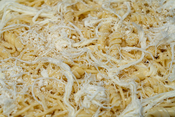 Wire cheese is ready to be served on the pasta.