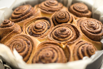 Fresh rolls Cinnabon, Cinnamon rolls in the form. Flavorful pastries