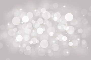 Abstract grey background with bokeh and stars.