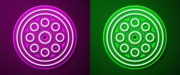 Glowing neon line Sewing button for clothes icon isolated on purple and green background. Clothing button. Vector Illustration