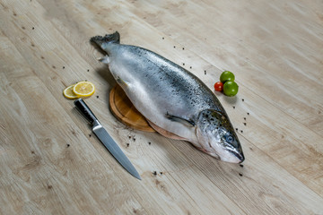 salmon on table with knife